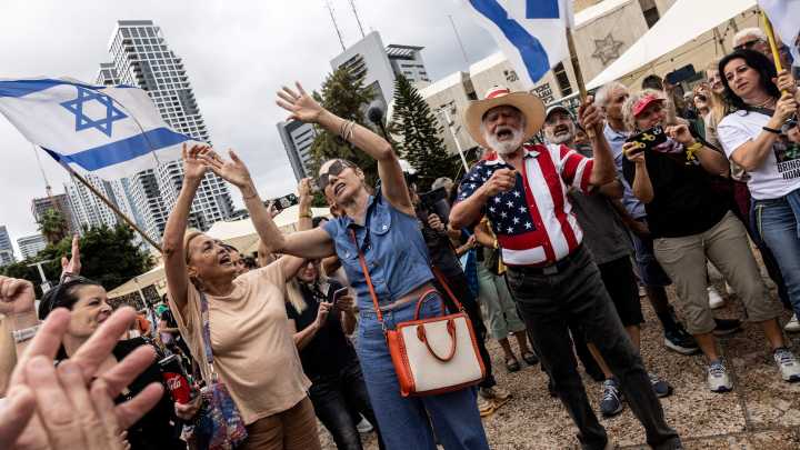 Israelis and Palestinians celebrate Gaza ceasefire deal that would release hostages