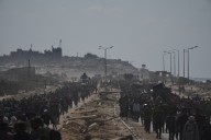 Thousands of Palestinians return to what's left of their homes as Gaza ceasefire takes effect