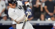 Judge rallies Yankees past Blue Jays 9-6 to save season and avert ALDS sweep