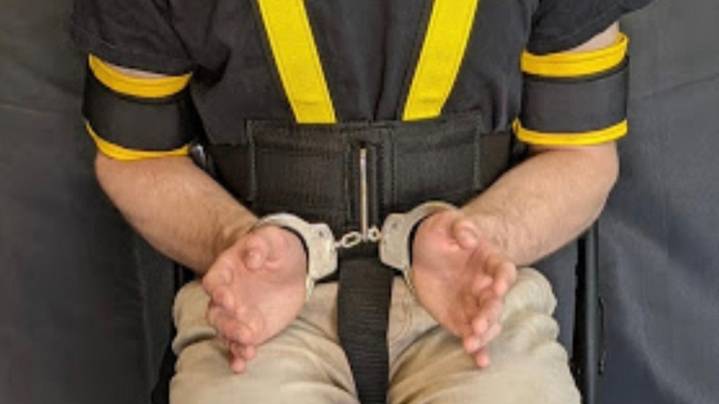 ICE's use of full-body restraints during deportations raises concerns over inhumane treatment