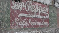1920s vintage Dr Pepper mural uncovered in Lufkin during jailhouse demolition