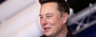 Tesla Urges Delaware Top Court to Revive Musk’s Record Pay Deal