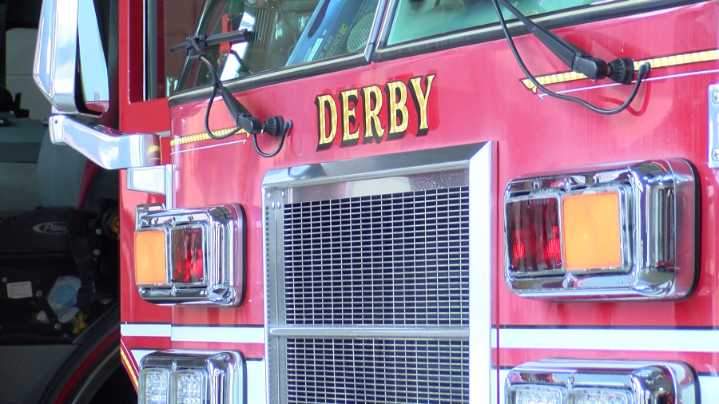 Grass fire destroys outbuilding in Derby