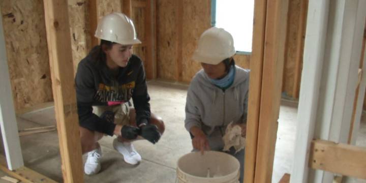 Iowa women’s athletic teams partner with Habitat for Humanity to build affordable homes