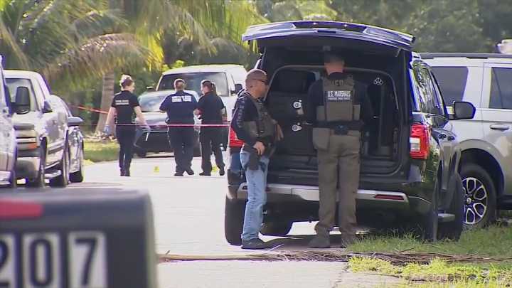 Police: 1 of 2 officers shot by friendly fire outside West Palm Beach home during shootout with suspect
