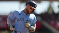 Jays’ Bichette takes ground balls at second base ahead of World Series