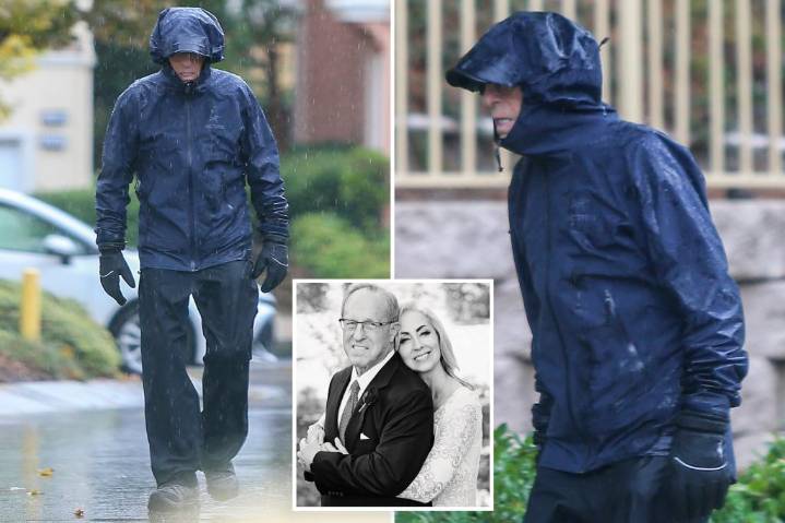 Mitt Romney's despondent brother strolls through rain days after estranged wife found dead