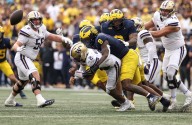 Photos: Washington Huskies take on Michigan Wolverines