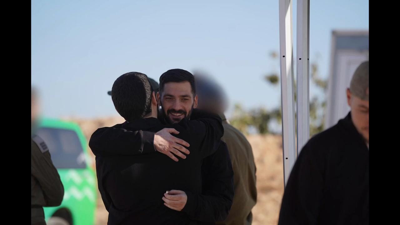 Israeli military photos of released hostages on arrival in Re'im, southern Israel