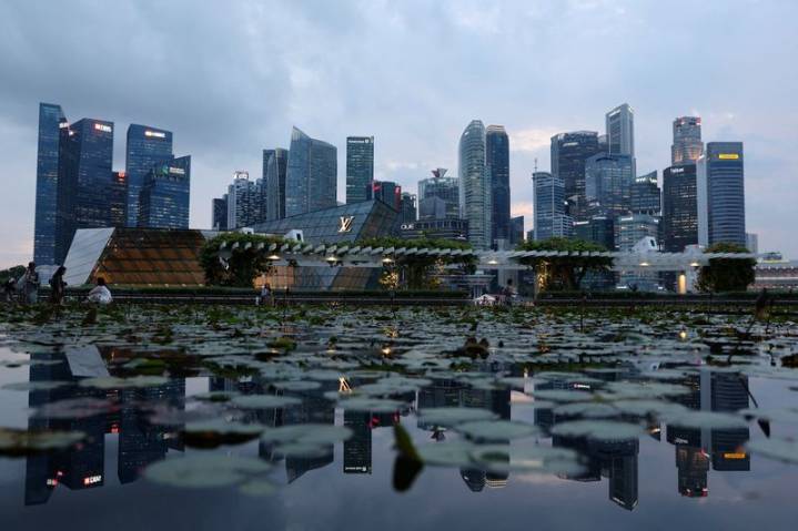 Singapore to cane scammers and mules under tightened laws, local media reports