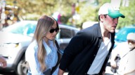 Sydney Sweeney Looks All Business in Short Skirt, Holds Scooter Braun's Hand
