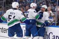 Sherwood has hat trick, DeBrusk scores in shootout as Canucks beat Blues 4