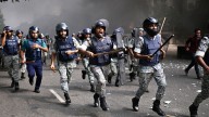 Clashes break out near Bangladesh parliament as major parties sign a roadmap for change