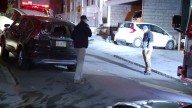 Woman dies after getting pinned by SUV she got out of to check on infant