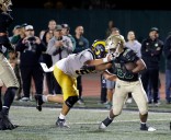 Long Beach Poly football holds off late charge from Millikan