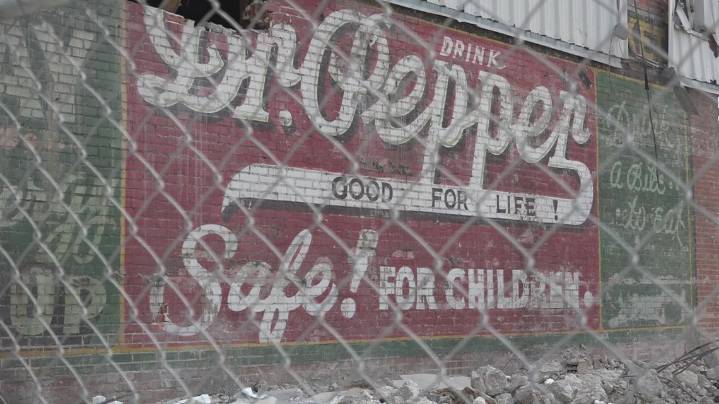 1920s vintage Dr Pepper mural uncovered in Lufkin during jailhouse demolition