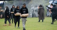 Community healing together as ancestors reburied