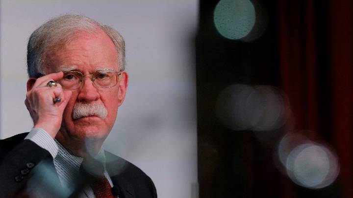 Trump critic John Bolton surrenders after indictment on charges of mishandling classified info