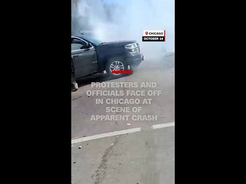 Protesters and officials face off in Chicago at scene of apparent crash
