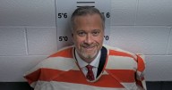 Embattled district attorney resigns