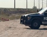 Hallan un muerto envuelto en una lona