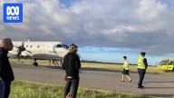 Rex flight evacuated after engine catches fire at Adelaide Airport