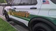 Middle school student arrested after Clay County deputies say she wrote threats to ‘bomb’ school on bathroom wall