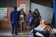 Bolivia holds tight presidential runoff as voters seek a leader to lift them from crisis