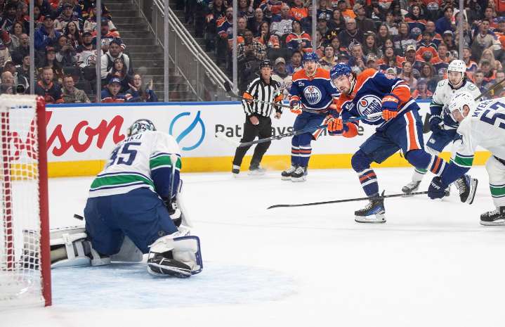Oilers net first win with 3-1 decision over resilient Canucks