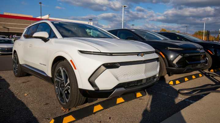 Automakers take a hit from tariffs, but some still see strong earnings : NPR