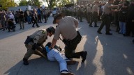 Protesters at ICE facility object to barricades, agents detain multiple people