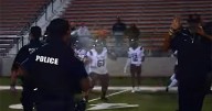 Police mace high school kids in front of screaming parents after brutal fight
