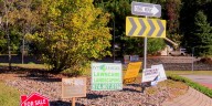 Safety concerns arise over large amount of yard signs at roundabout in St. Joseph County