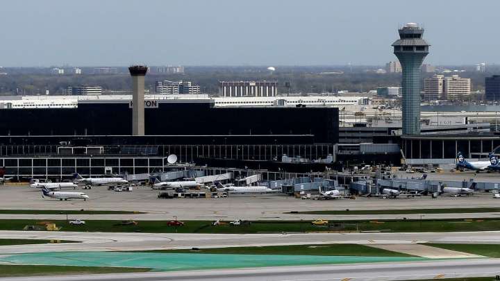 Delays spread to major airports across the country, as the seventh day of government shutdown impacts travelers