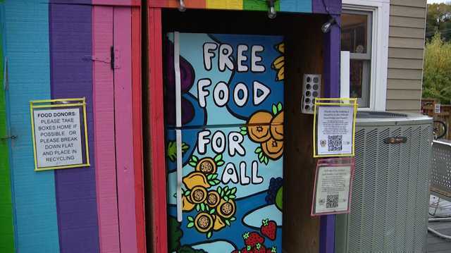 Millvale Community Library using Giant Eagle penny exchange to feed hungry