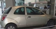 Violento choque en San Cristóbal terminó con una mujer arrollada y un auto adentro de un gimnasio