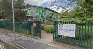 Masked gang in 'with weapons' force school into lockdown as kids 'hide under desks'