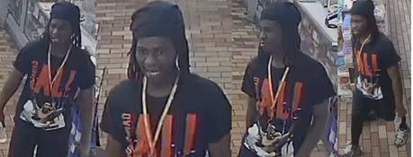 Police search for suspects in drive-by shooting of woman