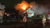 Firefighter injured while responding to house fire in north Toledo