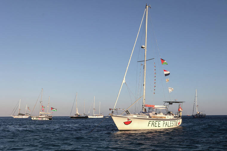 Israeli military boards several aid boats bound for Gaza