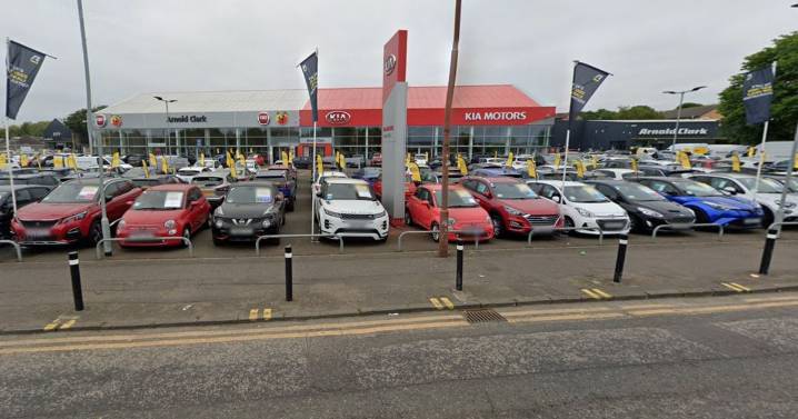 Edinburgh man 'seriously injured' in hospital after being hit by car at showroom