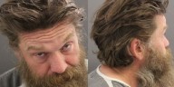 Rifle man arrested after allegedly threatening to kill police officers
