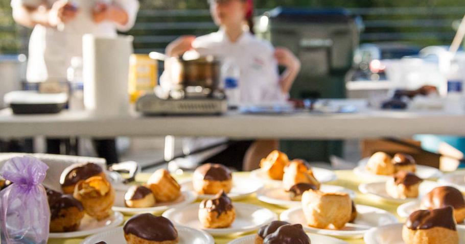 Local 'heroes' are cooking again for abused children