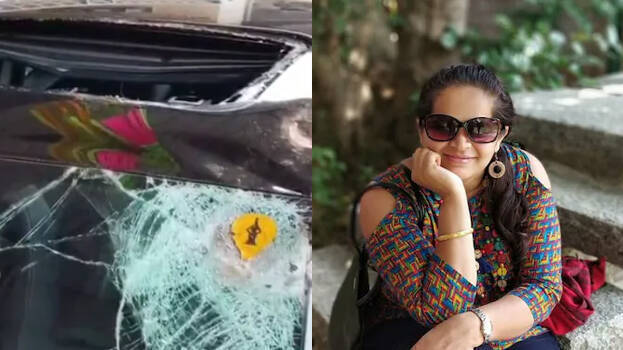 Woman dies after massive rock falls from hill on car