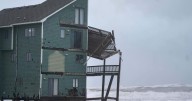 Dozens rescued as remnants of typhoon hits Alaska while nor'easter brings flooding to East Coast