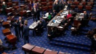 Senate returns in search of a deal on sixth day of federal government shutdown