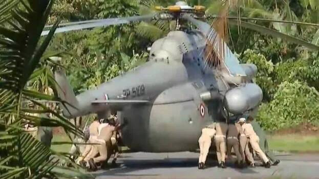 Tyre of copter carrying President gets stuck in concrete; police and fire force had to push