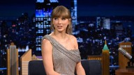 Taylor Swift showcases her ultra long legs in silver mini dress in head-turning appearance on The Tonight Show