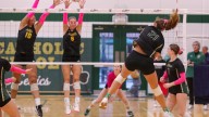 See the photos! Trinity Catholic volleyball takes on Forest