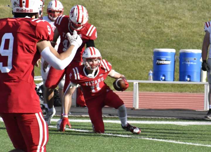 Holman's second-half heroics send Titans to quarterfinals